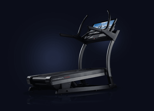 Image of a treadmill on a dark blueish gradient.