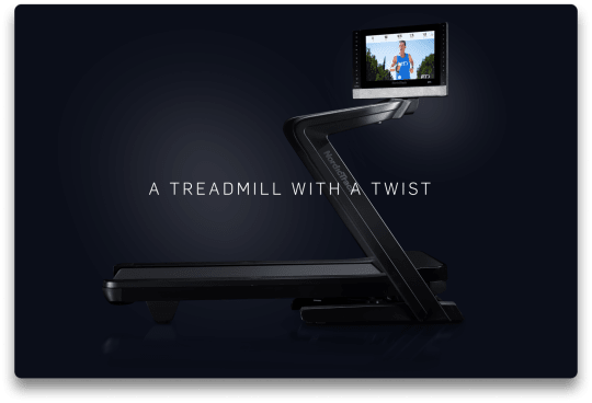 2450 treadmill with dark , sleek, bluish gradients in the background.