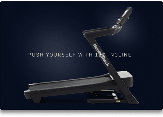 Side shot of an inclined treadmill on dark blue gradient background