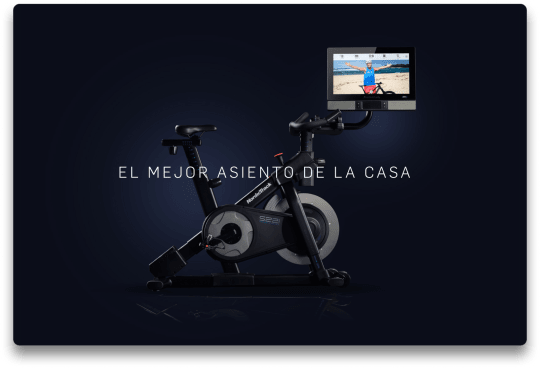 Foto de perfil de bicicleta sobre fondo azul. La pantalla que está mirando está inclinada para ver.