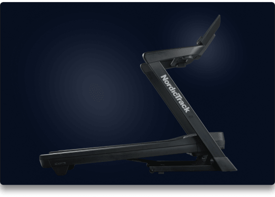Side shot of an inclined treadmill on dark blue gradient background