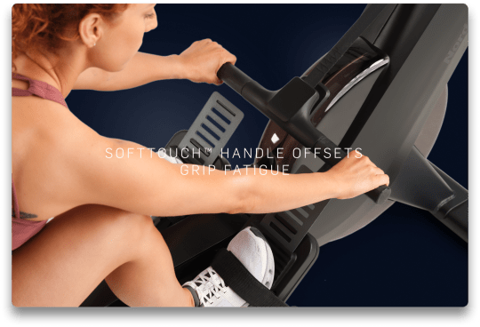 woman exercising on the rw600 rower with the focus on the soft touch handle