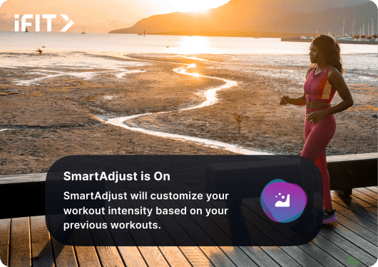 iFIT trainer running outside with a nature background