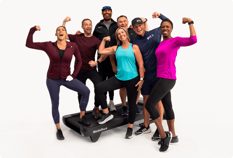 iFIT Member Cristal, posing for a picture with iFIT trainers