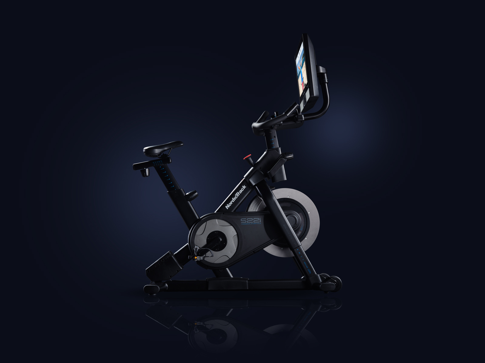 Profile image of the bike with the screen being a profile shot as well. All on a dark blue gradient background.