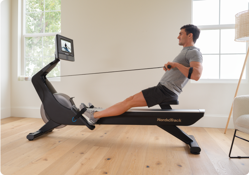 Man rowing on the RW700 Rower.