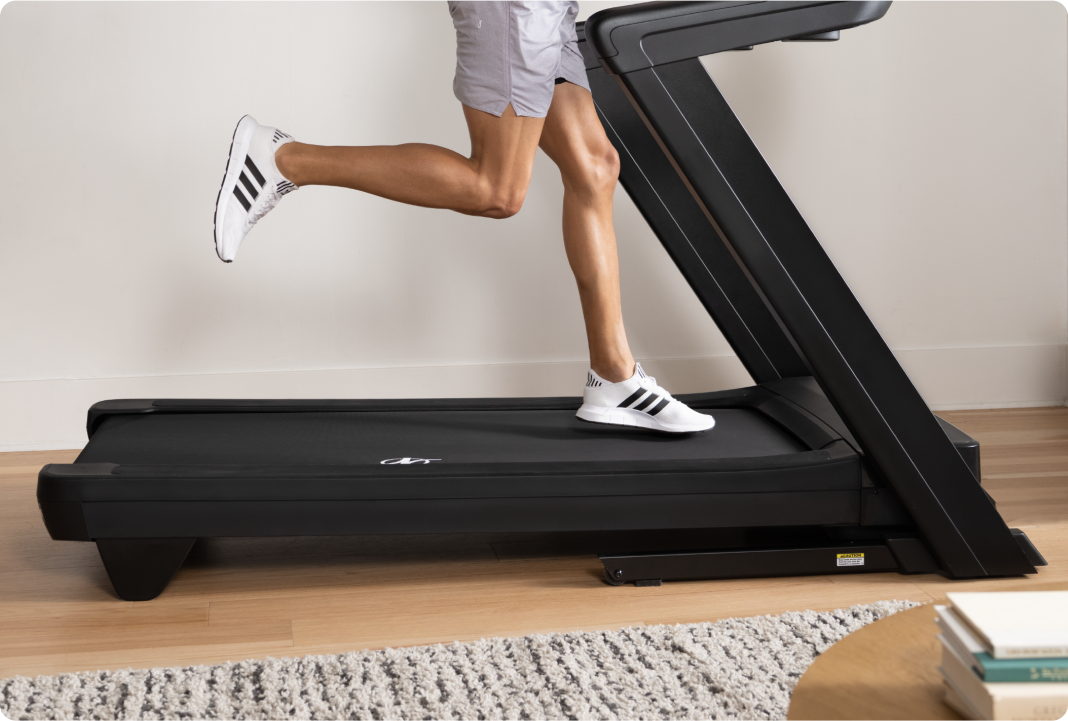 Man running on a NordicTrack treadmill.