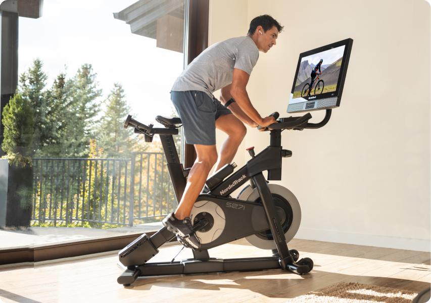 Man riding a NordicTrack exercise bike.